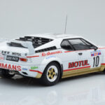 BMW M1 Motul #10 B. Darniche / A. Mahe Rally Tour de Corse 1982 IXO 1:18 - image 2 of 6