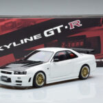 Nissan Skyline GT-R R34 Nismo Z-Tune Wit MotorHelix 1:18 - image 11 of 11