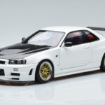 Nissan Skyline GT-R R34 Nismo Z-Tune Wit MotorHelix 1:18