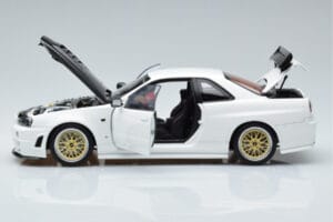 Nissan Skyline GT-R R34 Nismo Z-Tune Wit MotorHelix 1:18 M83407 Metaal — afbeelding 4 van 11