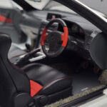 Nissan Skyline GT-R R34 Nismo Z-Tune Wit MotorHelix 1:18 - image 8 of 11