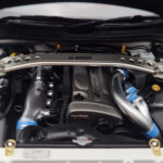 Nissan Skyline GT-R R34 Nismo Z-Tune Wit MotorHelix 1:18 - image 9 of 11