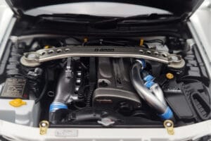 Nissan Skyline GT-R R34 Nismo Z-Tune Wit MotorHelix 1:18 M83407 Metaal — afbeelding 9 van 11