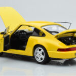 Porsche 911 964 Carrera 2 Geel Norev 1:18 - image 3 of 8