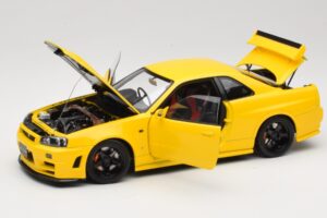 Nissan Skyline GT-R R34 Customized Version Geel MotorHelix 1:18 M83412 Metaal — afbeelding 2 van 8