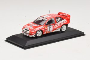 Ford Escort Cosworth Toshiba #11 A. Vatanen / Freeman 1994 Minichamps 1:43 430981811 Metaal — afbeelding 2 van 4