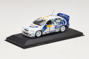 Ford Escort WRC #7 J. Kankkunen / J. Repo Rally Monte Carlo 1998 Minichamps 1:43 430988707 Metaal — afbeelding 2 van 4