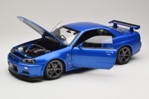 Nissan Skyline GT-R R34 V-Spec II Blauw Metallic OEM Velgen KK-Scale 1:12 KKDC120211-1 Metaal — afbeelding 2 van 8